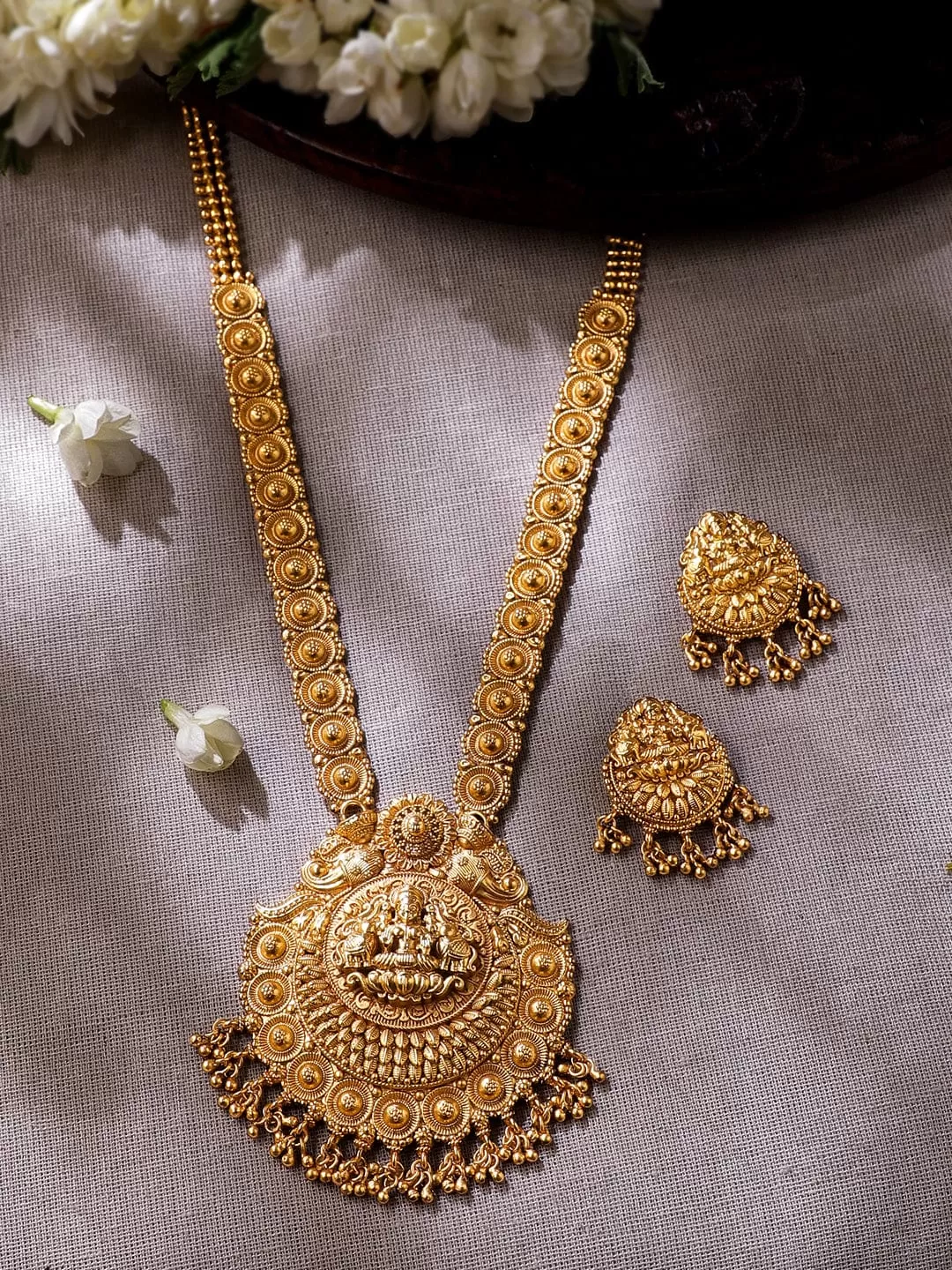 Rubans 22K Gold plated Mesmerizing Handcrafted Temple Jewellery Set