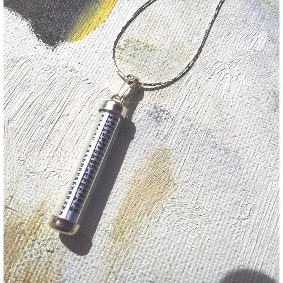 Sterling silver mezuzah necklace with scroll pendant on a silver chain